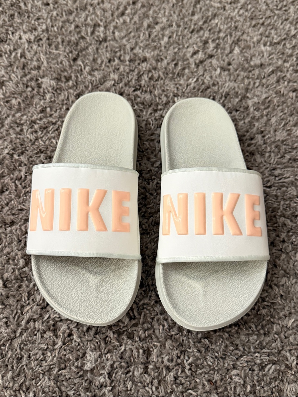Nike White Slides with Peach Logo